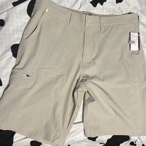 Tan  stretchable shorts with zip side pocket. Brand new never worn before